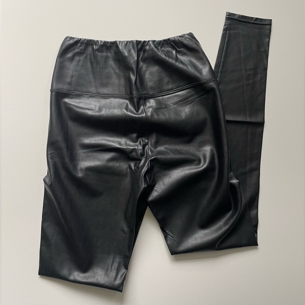 Wilfred Free vegan leather leggings in black.